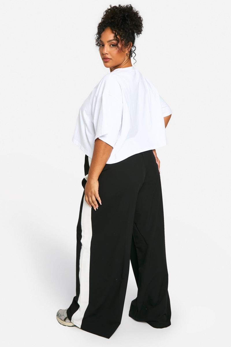 ПЛЮС БРЮКИ З БІКОВОЮ СМУЖКОЮ НА ТАЛІЇ