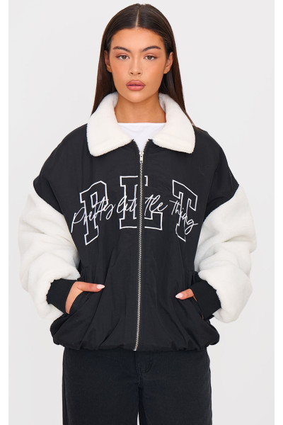 Чорний нейлоновий контрастний бомбер з рукавами зі штучного хутра Чорний нейлоновий контрастний бомбер з рукавами зі штучного хутра