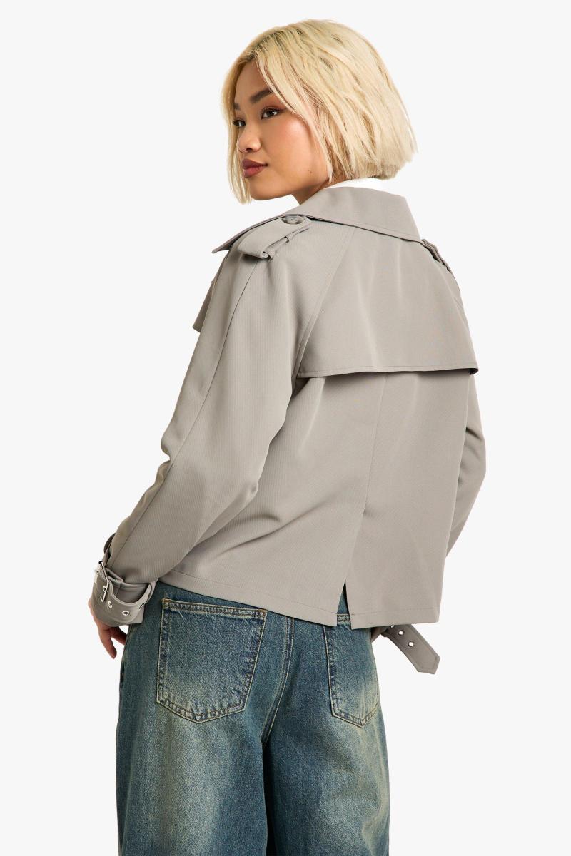 Двобортний короткий тренч великого розміру