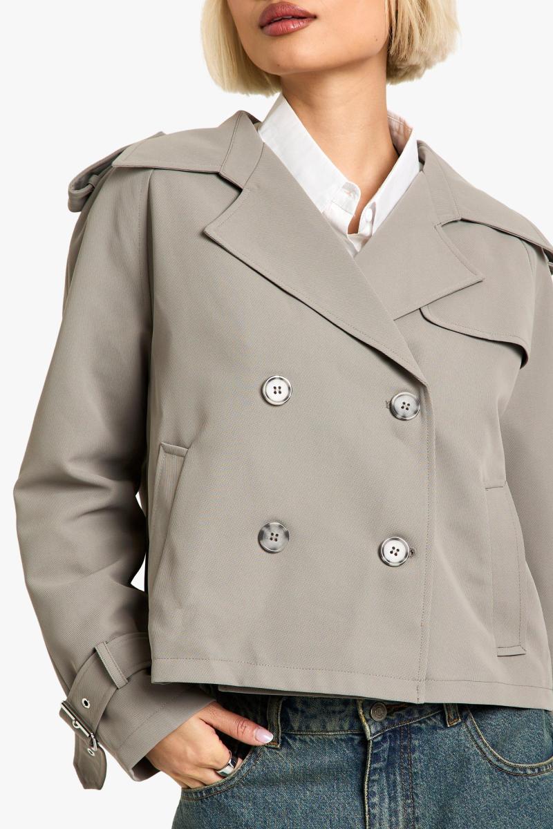 Двобортний короткий тренч великого розміру