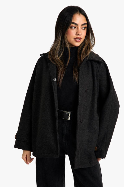 Асиметрична вовняна куртка