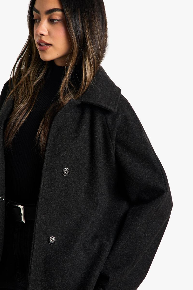 Асиметрична вовняна куртка