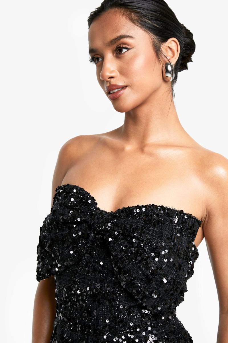 Маленький комбінезон з паєтками та бантом з букле