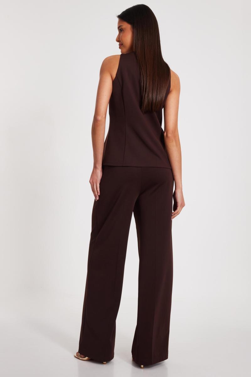 Коричневі штани для ніг