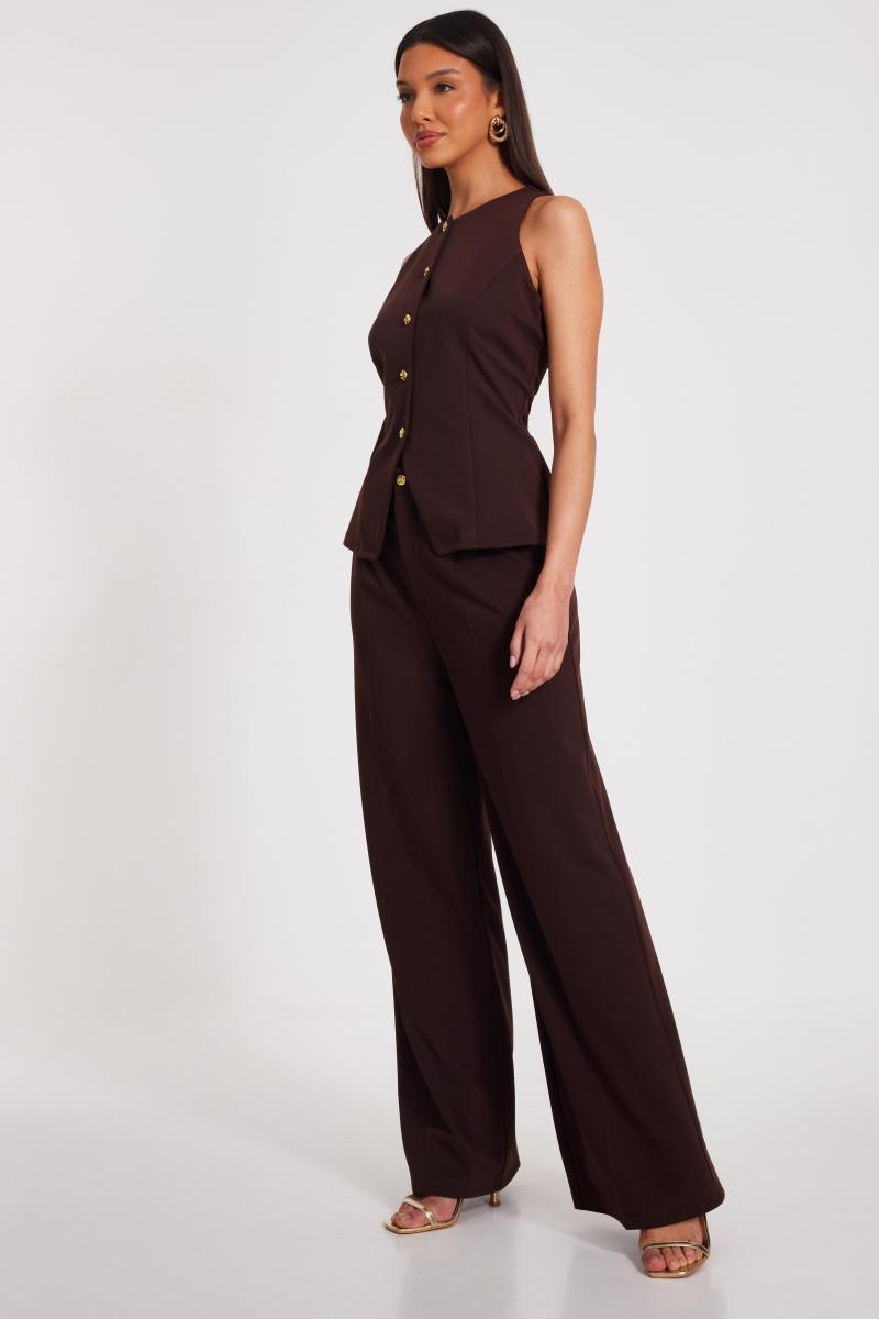 Коричневі штани для ніг