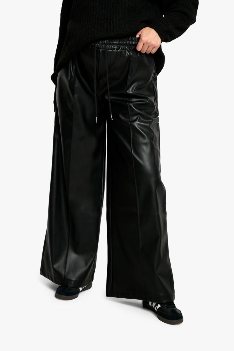 Материнська еластична талія PU широка нога пробіг