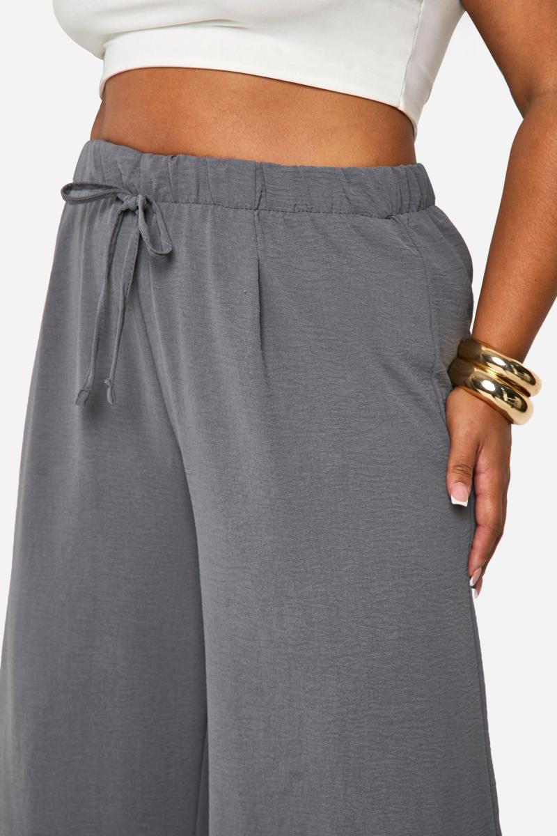 Плюс тканий штани для ніг