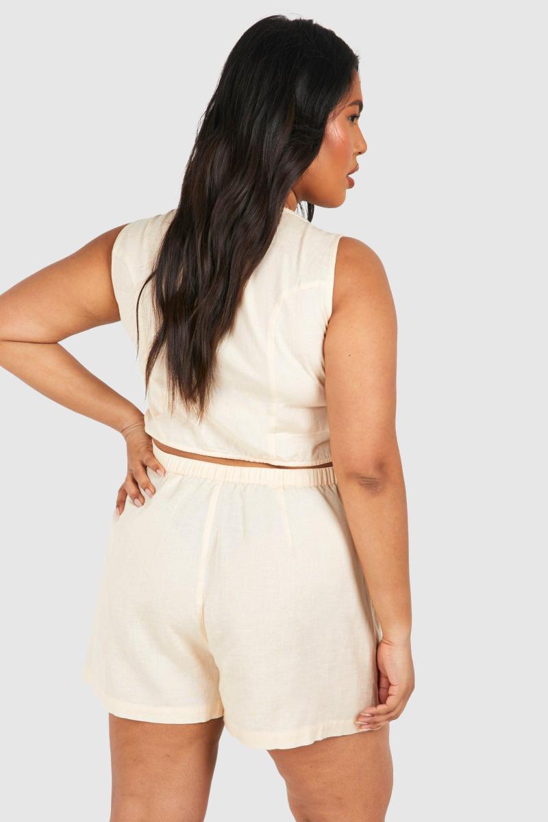 Іграшковий комбінезон на ґудзиках